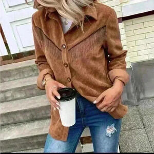 Brown corduroy top with metal fringe detail at lapel